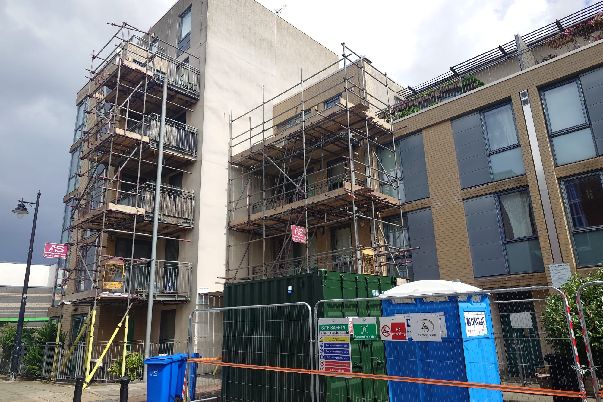 Balcony Repair Access Scaffolding, East London - Armstrong Scaffolding Armstrong Scaffolding access scaffold with cantilevered balcony platforms for balcony repair works on a multi-storey residential block in East London