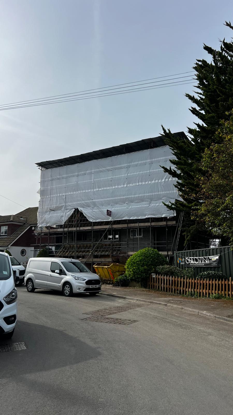 Loft Conversion Scaffolding & Temporary Roof, Tonbridge - Armstrong Scaffolding Armstrong Scaffolding loft conversion scaffold with shrink-wrap encapsulated temporary roof over a residential property in Tonbridge, providing weatherproof access for roof and loft works